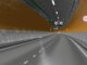 Render oficial que muestra el interior del proyecto del túnel Agua Negra, con carriles iluminados y señalización vial, representando cómo sería el tránsito dentro de el túnel más largo de América